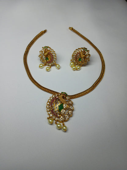 Khan's Collections Matte  Necklace Set With AD Stone and Pearls in Peacock design