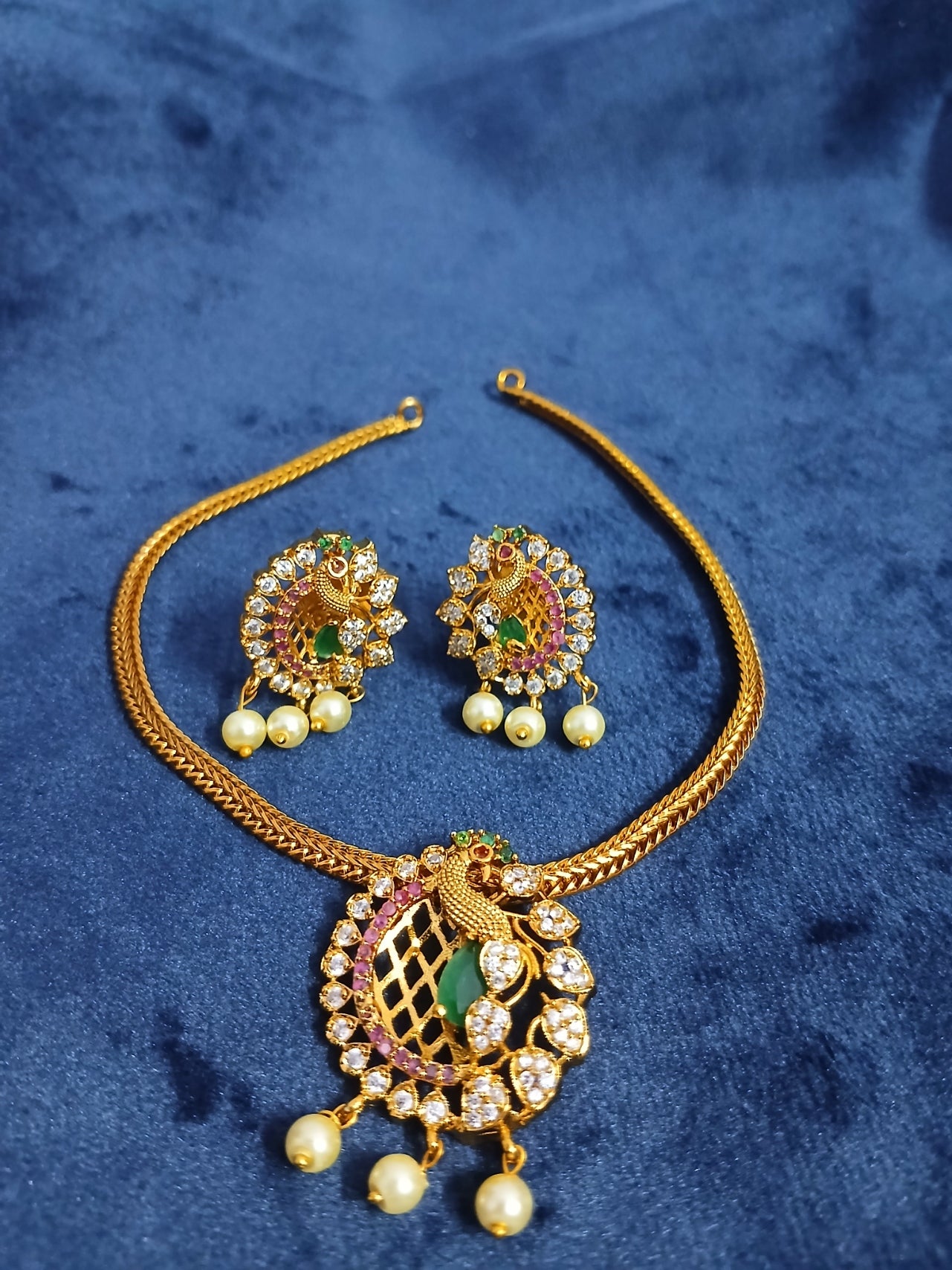 Khan's Collections Matte  Necklace Set With AD Stone and Pearls in Peacock design