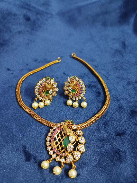 Khan's Collections Matte  Necklace Set With AD Stone and Pearls in Peacock design